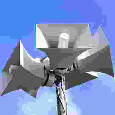 A close up of the top of a wind turbine