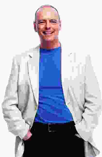 A man in white jacket and black pants.