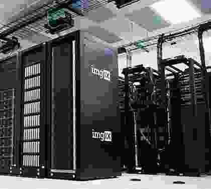 A black and white photo of some servers.