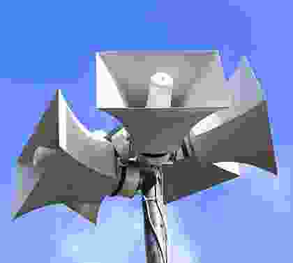 A close up of the top of a wind turbine